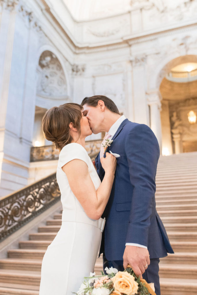 Bride and groom standing in the San Francisco court house. Photos by Shannon Alyse Photography