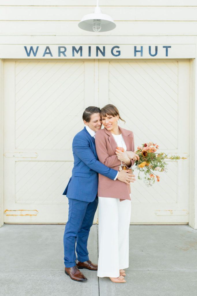 Bride and groom standing in front of San Francisco's warming hunt. Photos by Shannon Alyse Photography