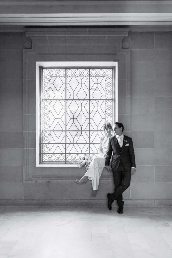 Bride and groom standing in the San Francisco court house. Photos by Shannon Alyse Photography