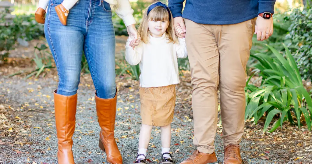 Maroon, grey, and navy color scheme in autumn family photo